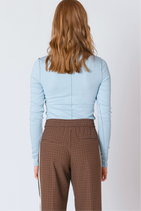 ICE BLUE EXPOSED SEAM TURTLENECK